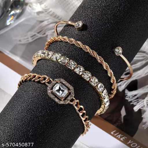 Four Piece Gold Tone Party Bracelet Set
